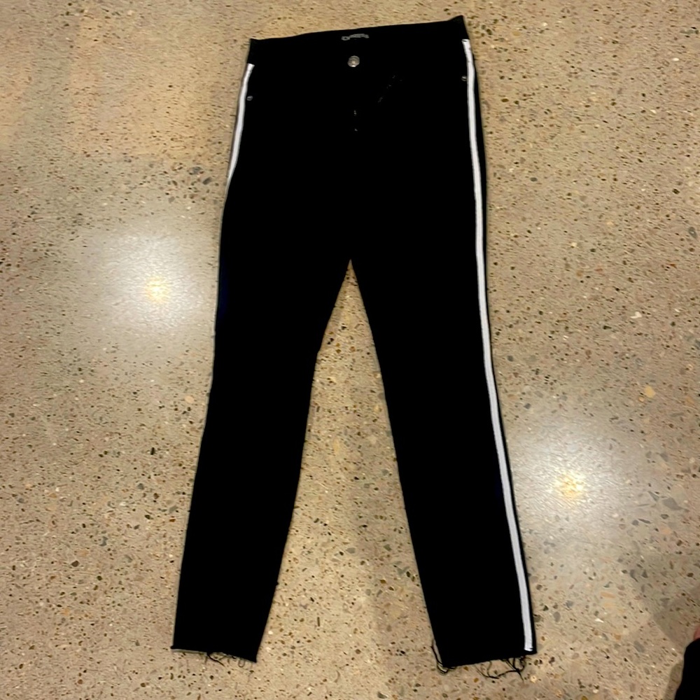 Women’s black jeans with white stripe